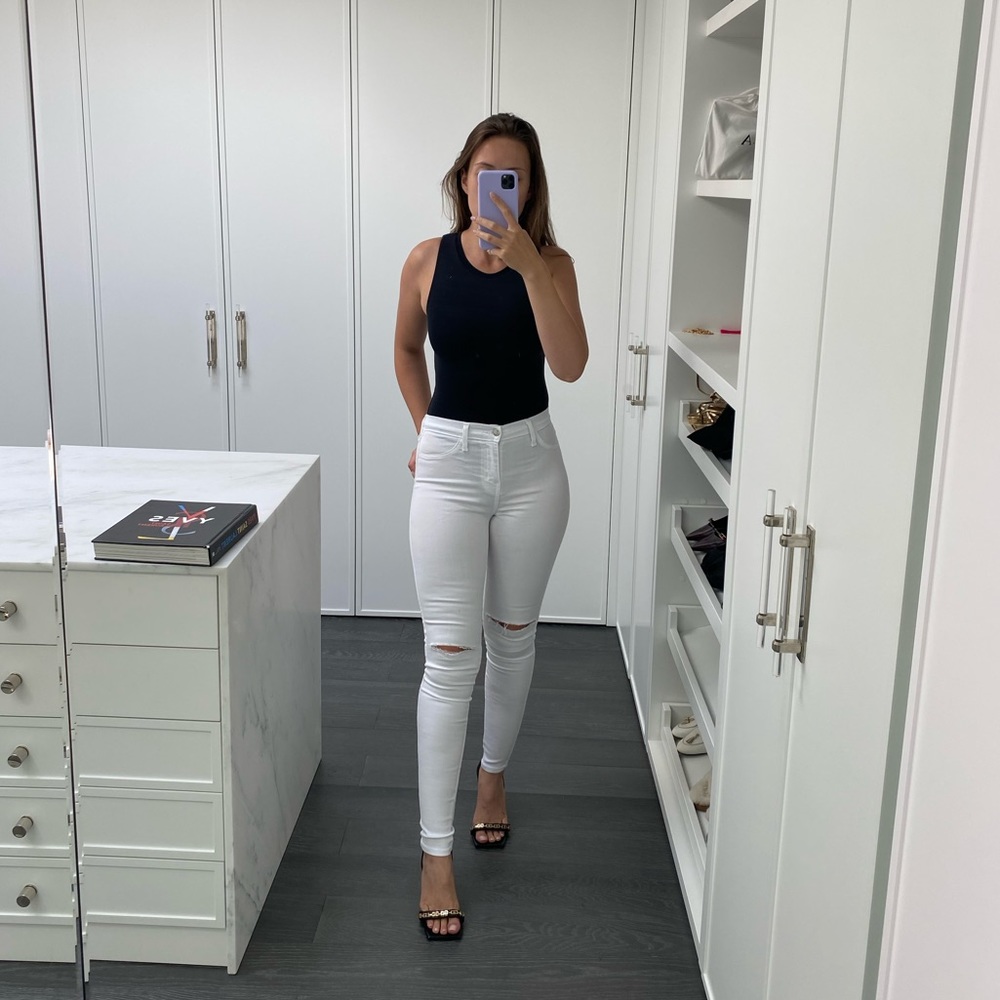 Fashion Nova white skinny jeans with ripped knees